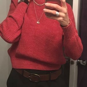 Salmon coloured thick cotton sweater.